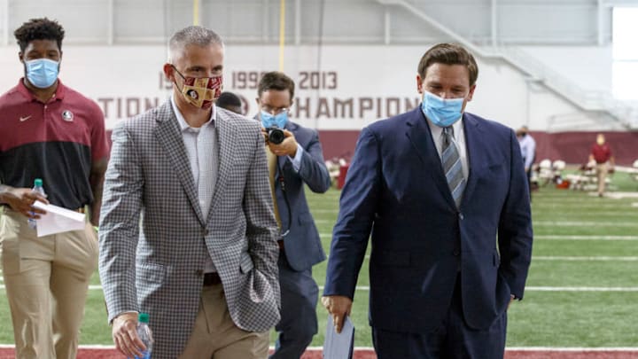 Florida Gov. Ron DeSantis and head coach Mike Norvell of the Florida State Seminoles Football Team (Photo by Don Juan Moore/Getty Images)