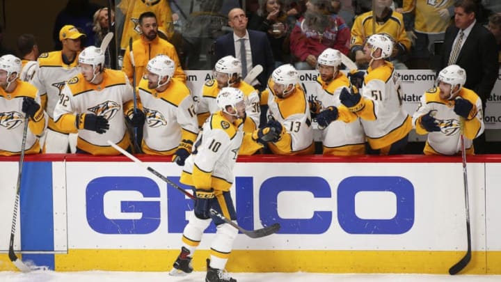 DENVER, CO - APRIL 18: Members of the Nashville Predators congratulate center Colton Sissons (10) following a second period goal during a first round playoff game between the Colorado Avalanche and the visiting Nashville Predators on April 18, 2018 at the Pepsi Center in Denver, CO. (Photo by Russell Lansford/Icon Sportswire via Getty Images)