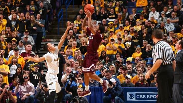 ST. LOUIS, MO – MARCH 4: Dequon Miller #4 of the Missouri State Bears shoots the ball against Landry Shamet #11 of the Wichita State Shockers during the Missouri Valley Conference Basketball Tournament Semifinals at the Scottrade Center on March 4, 2017 in St. Louis, Missouri. (Photo by Dilip Vishwanat/Getty Images)