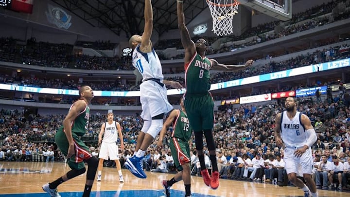 Dec 7, 2014; Dallas, TX, USA; Dallas Mavericks guard Devin Harris (20) shoots over Milwaukee Bucks center Larry Sanders (8) during the first quarter at the American Airlines Center. Mandatory Credit: Jerome Miron-USA TODAY Sports Dec 7, 2014; Dallas, TX, USA; Dallas Mavericks guard Devin Harris (20) shoots over Milwaukee Bucks center Larry Sanders (8) during the first quarter at the American Airlines Center. Mandatory Credit: Jerome Miron-USA TODAY Sports