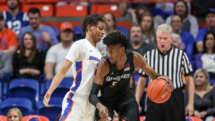 BOISE, ID – JANUARY 5: Guard Derrick Alston #21 of the Boise State Broncos and forward Jalen McDaniels #5 of the San Diego State Aztecs collide during first half action on January 5, 2019 at Taco Bell Arena in Boise, Idaho. (Photo by Loren Orr/Getty Images)