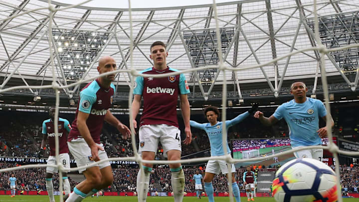 LONDON, ENGLAND - APRIL 29: Declan Rice of West Ham United reacts to scoring a own goal for Manchester City's second goal of the game during the Premier League match between West Ham United and Manchester City at London Stadium on April 29, 2018 in London, England. (Photo by Catherine Ivill/Getty Images)