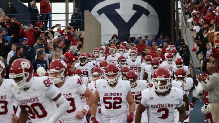 Nov 18, 2023; Provo, Utah, USA; The Oklahoma Sooners enter the field before the game against the Brigham Young Cougars at LaVell Edwards Stadium. Mandatory Credit: Rob Gray-USA TODAY Sports