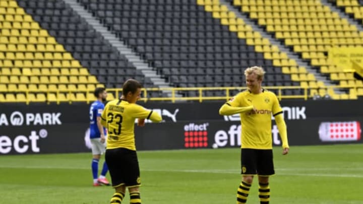 Thorgan Hazard (L) and Julian Brandt played a crucial role in the win over Schalke last weekend (Photo by MARTIN MEISSNER/POOL/AFP via Getty Images)