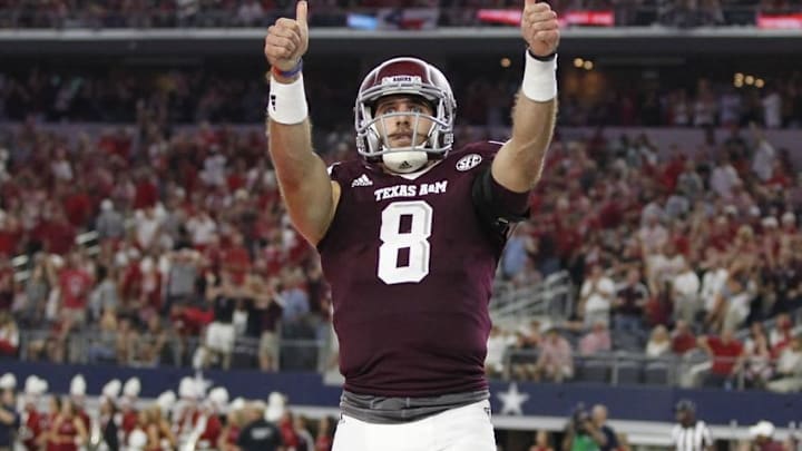 Sep 24, 2016; Dallas, TX, USA; Texas A&M Aggies quarterback Trevor Knight (8) celebrates scoring a touchdown in the second quarter against the Arkansas Razorbacks at AT&T Stadium. Mandatory Credit: Tim Heitman-USA TODAY Sports