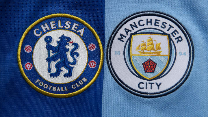 The Chelsea and Manchester City club crests (Photo by Visionhaus)