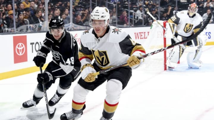 LOS ANGELES, CA - SEPTEMBER 19: Michael Eyssimont #48 of the Los Angeles Kings and Jimmy Schuldt #4 of the Vegas Golden Knights race for the puck during the first period of the preseason game at STAPLES Center on September 19, 2019 in Los Angeles, California. (Photo by Juan Ocampo/NHLI via Getty Images)