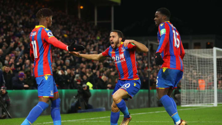 LONDON, ENGLAND - DECEMBER 28: Andros Townsend of Crystal Palace (C) celebrates as he scores their first and equalising goal with team mates Wilfried Zaha and Jeffrey Schlupp during the Premier League match between Crystal Palace and Arsenal at Selhurst Park on December 28, 2017 in London, England. (Photo by Dan Istitene/Getty Images)