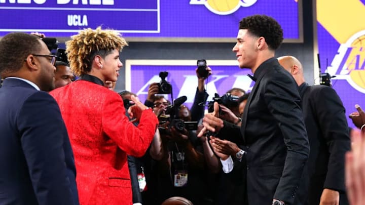 NEW YORK, NY - JUNE 22: Lonzo Ball reacts with his brother LaMelo Ball after being drafted second overall by the Los Angeles Lakers during the first round of the 2017 NBA Draft at Barclays Center on June 22, 2017 in New York City. NOTE TO USER: User expressly acknowledges and agrees that, by downloading and or using this photograph, User is consenting to the terms and conditions of the Getty Images License Agreement. (Photo by Mike Stobe/Getty Images)