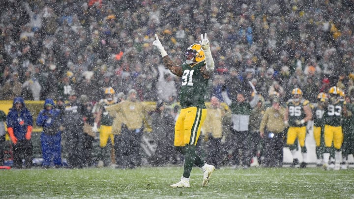 GREEN BAY, WISCONSIN – NOVEMBER 10: Preston Smith #91 of the Green Bay Packers celebrates a play against the Carolina Panthers during the fourth quarter in the game at Lambeau Field on November 10, 2019 in Green Bay, Wisconsin. (Photo by Stacy Revere/Getty Images)