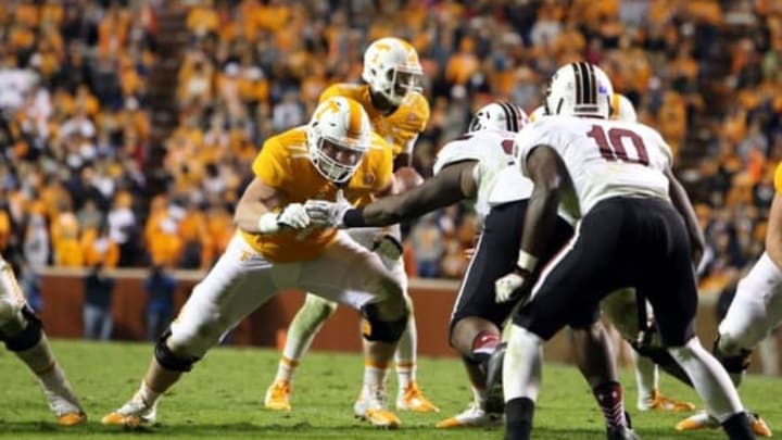 Nov 7, 2015; Knoxville, TN, USA; Tennessee Volunteers offensive lineman Dylan Wiesman (71) blocks for `Tennessee Volunteers quarterback Joshua Dobbs (11) against the South Carolina Gamecocks at Neyland Stadium. Mandatory Credit: Randy Sartin-USA TODAY Sports. Tennessee won 27 to 24.