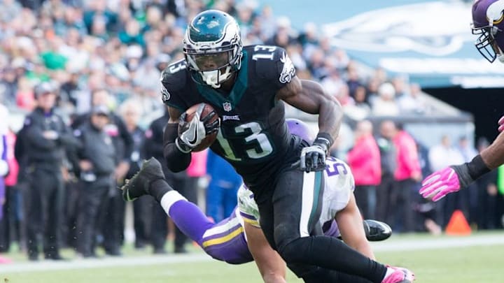 Oct 23, 2016; Philadelphia, PA, USA; Philadelphia Eagles wide receiver Josh Huff (13) runs past the tackle attempt of Minnesota Vikings outside linebacker Chad Greenway (52) during the second half at Lincoln Financial Field. The Philadelphia Eagles won 21-10. Mandatory Credit: Bill Streicher-USA TODAY Sports