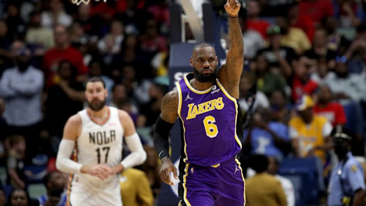 NEW ORLEANS, LOUISIANA - MARCH 27: LeBron James #6 of the Los Angeles Lakers reacts after scoring a basket during the first quarter of an NBA game against the New Orleans Pelicans at Smoothie King Center on March 27, 2022 in New Orleans, Louisiana. NOTE TO USER: User expressly acknowledges and agrees that, by downloading and or using this photograph, User is consenting to the terms and conditions of the Getty Images License Agreement. (Photo by Sean Gardner/Getty Images)