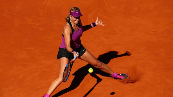 MADRID, SPAIN - MAY 02: Victoria Azarenka of Belarus plays a forehand against Alize Cornet of France in their second round match during day three of the Mutua Madrid Open tennis tournament at the Caja Magica on May 02, 2016 in Madrid,Spain. (Photo by Clive Brunskill/Getty Images)