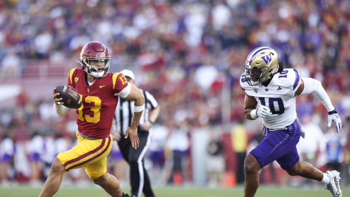 Nov 4, 2023; Los Angeles, California, USA; USC Trojans quarterback Caleb Williams (13) runs with the ball during the first quarter against the Washington Huskies at United Airlines Field at Los Angeles Memorial Coliseum. Mandatory Credit: Jessica Alcheh-USA TODAY Sports