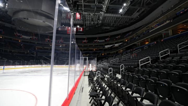 WASHINGTON, DC - MARCH 12: The ice and spectator seating is empty prior to the Detroit Red Wings playing against the Washington Capitals at Capital One Arena on March 12, 2020 in Washington, DC. Yesterday, the NBA suspended their season until further notice after a Utah Jazz player tested positive for the coronavirus (COVID-19). The NHL said per a release, that the uncertainty regarding next steps regarding the coronavirus, Clubs were advised not to conduct morning skates, practices or team meetings today. (Photo by Patrick Smith/Getty Images)