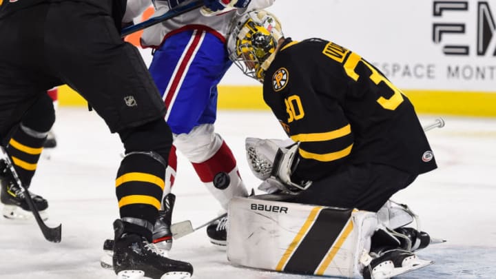LAVAL, QC - OCTOBER 16: Providence Bruins goalie Dan Vladar (30) drops the puck during the Providence Bruins versus the Laval Rocket game on October 16, 2019, at Place Bell in Laval, QC (Photo by David Kirouac/Icon Sportswire via Getty Images)