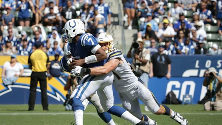 CARSON, CALIFORNIA - SEPTEMBER 08: Jacoby Brissett #7 of the Indianapolis Colts is sacked by Joey Bosa #97 of the Los Angeles Chargers in the third quarter at Dignity Health Sports Park on September 08, 2019 in Carson, California. The Chargers defeated the Colts 30-24 in overtime. (Photo by Jeff Gross/Getty Images)