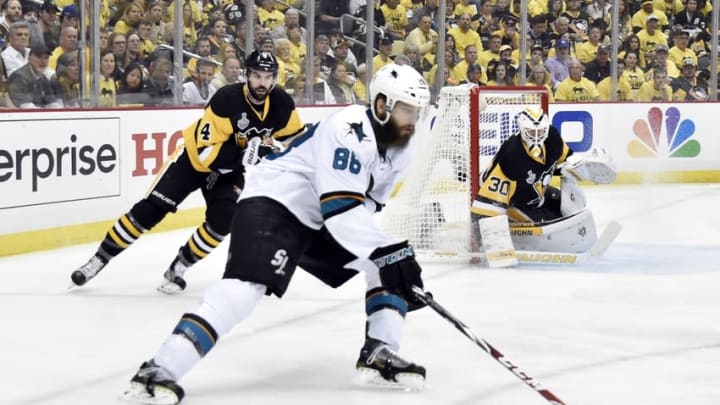 Jun 9, 2016; Pittsburgh, PA, USA; Pittsburgh Penguins goalie Matt Murray (30) and left wing Chris Kunitz (14) defend the net as San Jose Sharks defenseman Brent Burns (88) prepares to shoot the puck in the first period game five of the 2016 Stanley Cup Final at Consol Energy Center. Mandatory Credit: Don Wright-USA TODAY Sports