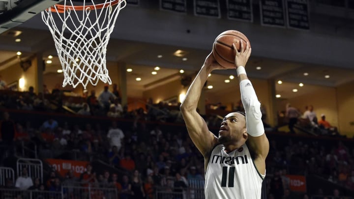 Feb 25, 2017; Coral Gables, FL, USA; Miami Hurricanes guard Bruce Brown (11) dunks the ball against Duke Blue Devils during the second half at Watsco Center. Mandatory Credit: Steve Mitchell-USA TODAY Sports