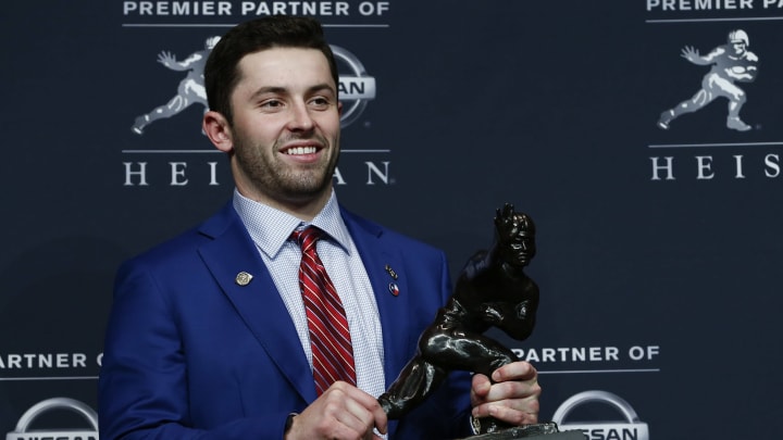 NEW YORK, NY – Baker Mayfield, quarterback of the Oklahoma Sooners, poses for the media after the 2017 Heisman Trophy Presentation. (Photo by Jeff Zelevansky/Getty Images)