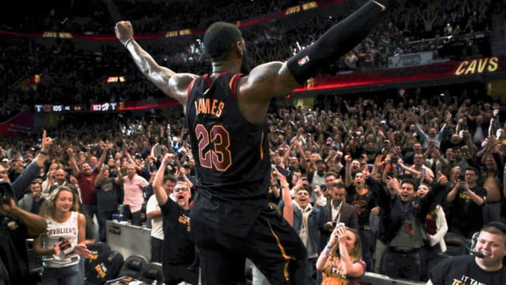 CLEVELAND, OH - MAY 5: LeBron James #23 of the Cleveland Cavaliers and Cleveland Cavaliers fans react after game winning shot against the Toronto Raptors after Game Three of the Eastern Conference Semi Finals of the 2018 NBA Playoffs against the Toronto Raptors on May 5, 2018 at Quicken Loans Arena in Cleveland, Ohio. NOTE TO USER: User expressly acknowledges and agrees that, by downloading and/or using this Photograph, user is consenting to the terms and conditions of the Getty Images License Agreement. Mandatory Copyright Notice: Copyright 2018 NBAE (Photo by Jeff Haynes/NBAE via Getty Images)