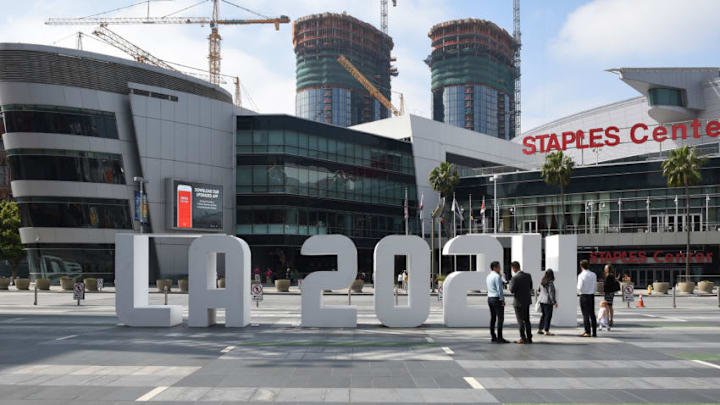 LOS ANGELES, CA - MAY 12: An LA 2024 sign is placed at LA Live in front of Staples Center as the International Olympic Committee Evaluation Commission continues its tour of proposed venues by LA 2024 bidding committee for the Los Angeles 2024 Summer Olympic Games May 12, 2017, in Los Angeles, California. (Photo by Kevork Djansezian/Getty Images)