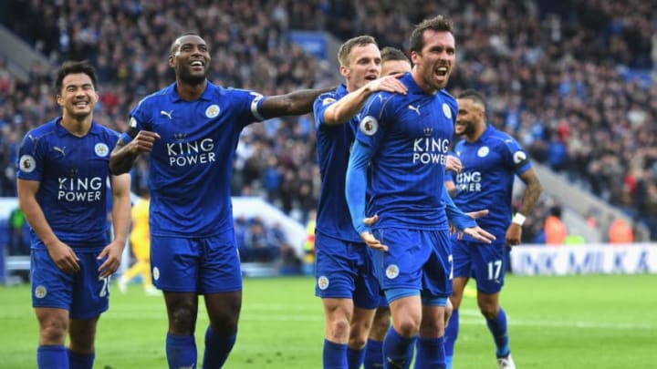 LEICESTER, ENGLAND - OCTOBER 22: Christian Fuchs of Leicester City (R) celebrates scoring his sides third goal with his Leicester City team mates during the Premier League match between Leicester City and Crystal Palace at The King Power Stadium on October 22, 2016 in Leicester, England. (Photo by Michael Regan/Getty Images)