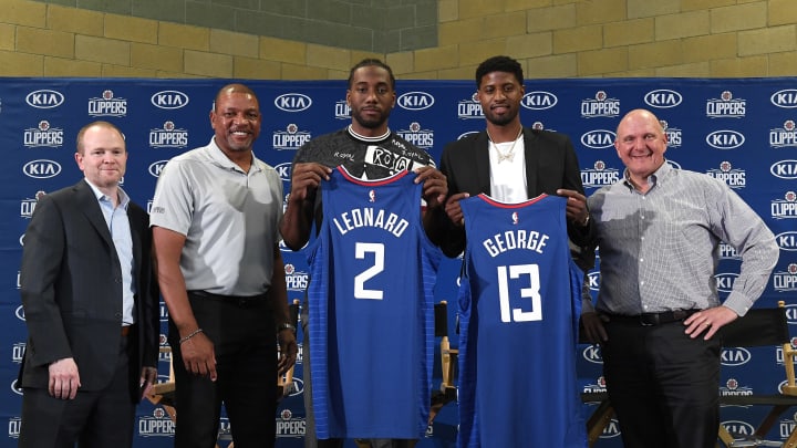 LOS ANGELES, CALIFORNIA – JULY 24: (L-R) President of Basketball Operations Lawrence Frank, head coach Doc Rivers, Paul George, Kawhi Leonard and owner Steve Ballmer of the Los Angeles Clippers attend the Paul George and Kawhi Leonard introductory press conference at Green Meadows Recreation Center on July 24, 2019 in Los Angeles, California. NOTE TO USER: User expressly acknowledges and agrees that, by downloading and or using this photograph, User is consenting to the terms and conditions of the Getty Images License Agreement. (Photo by Kevork Djansezian/Getty Images)