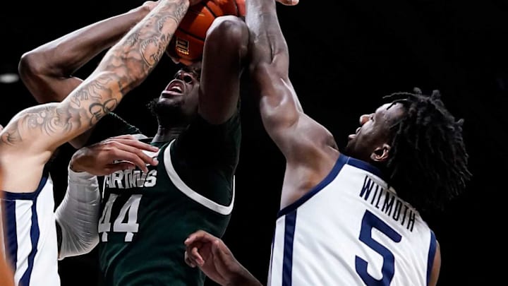 Michigan State Spartans forward Gabe Brown (44) attempts a lay-up against Butler Bulldogs forward Myles Wilmoth (5) on Wednesday, Nov. 17, 2021 at Hinkle Fieldhouse, in Indianapolis. Michigan State Spartans lead at the half, 31-23.Ncaa Basketball Ini 1117 Ncaa Men S Basketball Michigan State At Butler