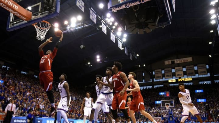 LAWRENCE, KS - DECEMBER 10: Jordy Tshimanga #32 of the Nebraska Cornhuskers lays the ball up against the Kansas Jayhawks in the second half at Allen Field House on December 10, 2016 in Lawrence, Kansas. (Photo by Ed Zurga/Getty Images)