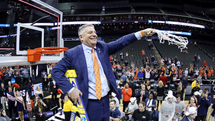 KANSAS CITY, MISSOURI – MARCH 31: Head coach Bruce Pearl of the Auburn Tigers cuts the net after defeating the Kentucky Wildcats 77-71 in overtime during the 2019 NCAA Basketball Tournament Midwest Regional at Sprint Center on March 31, 2019 in Kansas City, Missouri. (Photo by Jamie Squire/Getty Images)