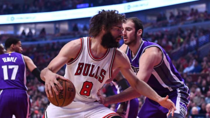 Jan 21, 2017; Chicago, IL, USA; Chicago Bulls center Robin Lopez (8) dribbles the ball against Sacramento Kings center Kosta Koufos (41) during the first half at the United Center. Mandatory Credit: Mike DiNovo-USA TODAY Sports