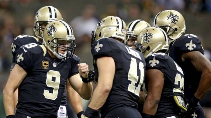 Oct 26, 2014; New Orleans, LA, USA; New Orleans Saints quarterback Drew Brees (9) huddles with fullback Erik Lorig (41) and teammates during warmups prior to kickoff against the Green Bay Packers at the Mercedes-Benz Superdome. Mandatory Credit: Crystal LoGiudice-USA TODAY Sports Oct 26, 2014; New Orleans, LA, USA; New Orleans Saints quarterback Drew Brees (9) huddles with fullback Erik Lorig (41) and teammates during warmups prior to kickoff against the Green Bay Packers at the Mercedes-Benz Superdome. Mandatory Credit: Crystal LoGiudice-USA TODAY Sports
