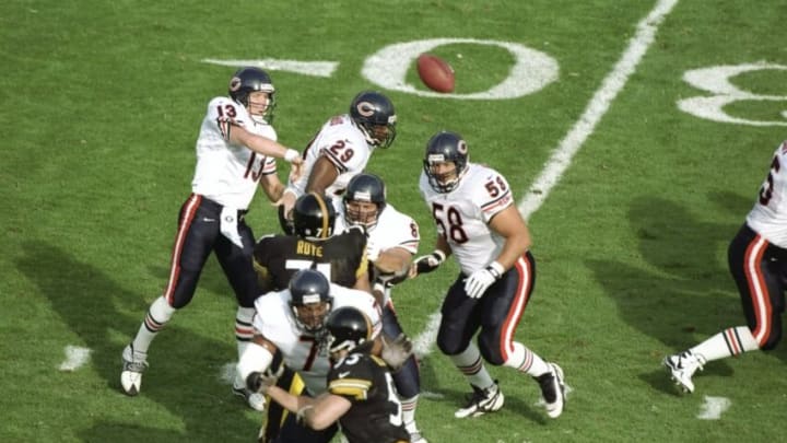 27 Jul 1997: Quarterback Rick Mirer of the Chicago Bears (left) throws the ball during the American Bowl against the Pittsburgh Steelers at Croke Park in Dublin, Ireland. The Steelers won the game, 20-17. Mandatory Credit: Clive Brunskill /Allsport