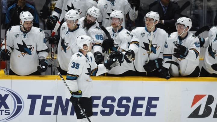 Apr 2, 2016; Nashville, TN, USA; San Jose Sharks center Logan Couture (39) is congratulated by teammates after a shootout goal against the Nashville Predators at Bridgestone Arena. The Sharks won 3-2 in a shootout. Mandatory Credit: Christopher Hanewinckel-USA TODAY Sports