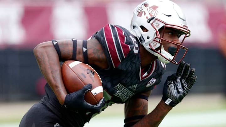 STARKVILLE, MS - NOVEMBER 4: Reginald Todd #20 of the Mississippi State Bulldogs carries the ball during the second half of an NCAA football game against the Massachusetts Minutemen at Davis Wade Stadium on November 4, 2017 in Starkville, Mississippi. (Photo by Butch Dill/Getty Images)