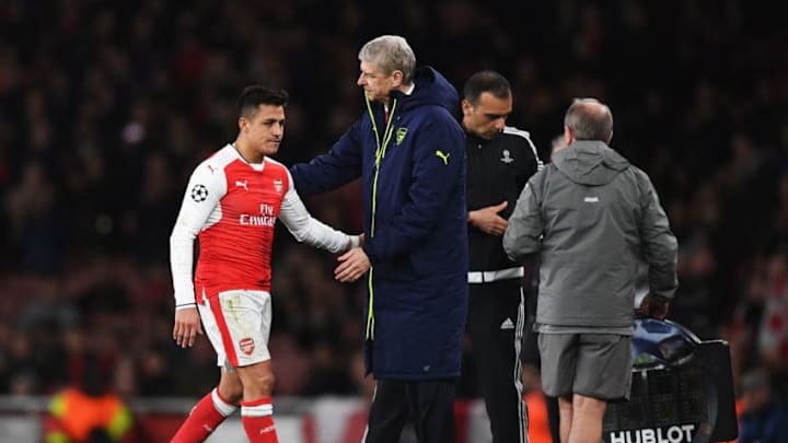 LONDON, ENGLAND - MARCH 07: Alexis Sanchez of Arsenal is consoled by Arsene Wenger, Manager of Arsenal as he is substituted during the UEFA Champions League Round of 16 second leg match between Arsenal FC and FC Bayern Muenchen at Emirates Stadium on March 7, 2017 in London, United Kingdom. (Photo by Shaun Botterill/Getty Images)