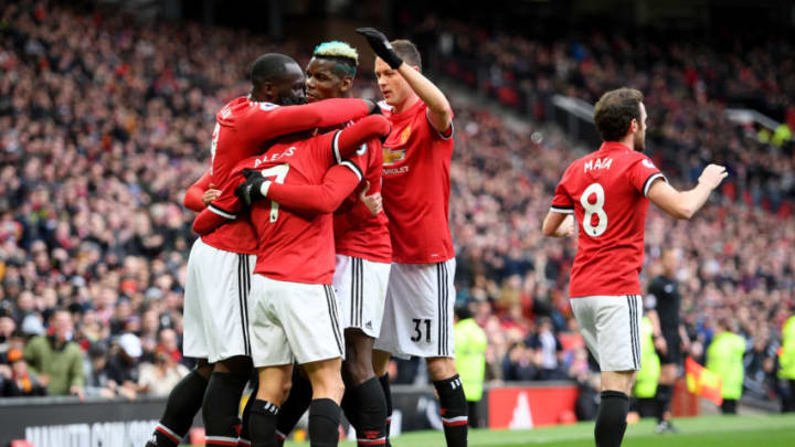 MANCHESTER, ENGLAND - MARCH 31: Alexis Sanchez of Manchester United celebrates with teammates during the Premier League match between Manchester United and Swansea City at Old Trafford on March 31, 2018 in Manchester, England. (Photo by Ross Kinnaird/Getty Images)
