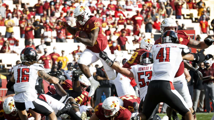 Oct 10, 2020; Ames, Iowa, USA; Iowa State running back Breece Hall (28) goes up and over the line for a touchdown to make the score 20-7 during their football game against Texas Tech at Jack Trice Stadium. Mandatory Credit: Brian Powers-USA TODAY Sports