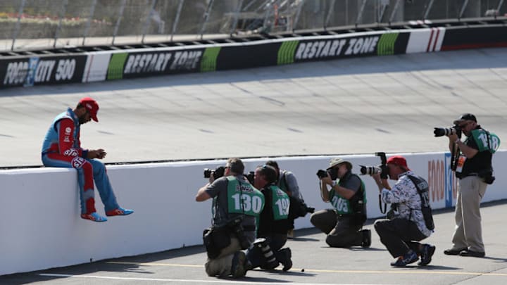 BRISTOL, TN - APRIL 14: Darrell Wallace Jr., driver of the #43 STP Chevrolet, sits on the pit wall while photographers take his picture during practice for the Monster Energy NASCAR Cup Series Food City 500 at Bristol Motor Speedway on April 14, 2018 in Bristol, Tennessee. (Photo by Jerry Markland/Getty Images)