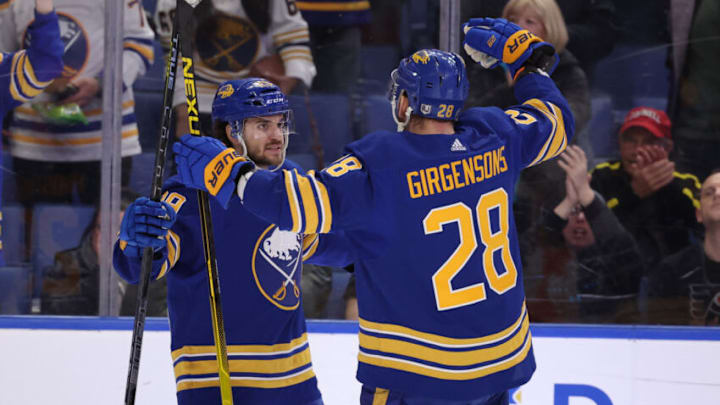 Apr 16, 2022; Buffalo, New York, USA; Buffalo Sabres center Vinnie Hinostroza (29) celebrates his goal with left wing Zemgus Girgensons (28) during the second period against the Philadelphia Flyers at KeyBank Center. Mandatory Credit: Timothy T. Ludwig-USA TODAY Sports