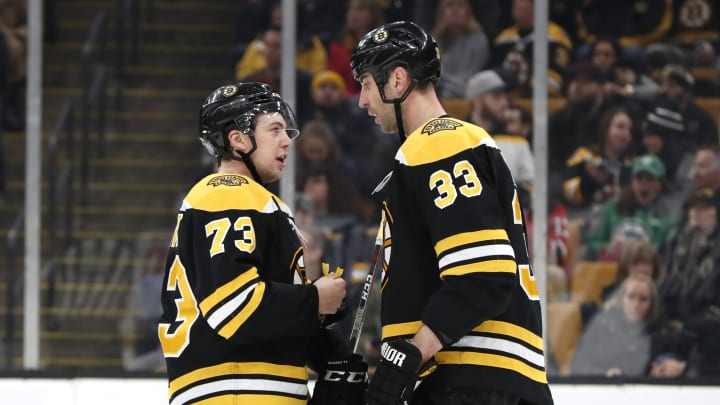 BOSTON, MA - MARCH 02: Boston Bruins right defenseman Charlie McAvoy (73) confers with Boston Bruins left defenseman Zdeno Chara (33) during a game between the Boston Bruins and the New Jersey Devils on March 2, 2019, at TD Garden in Boston, Massachusetts. (Photo by Fred Kfoury III/Icon Sportswire via Getty Images)