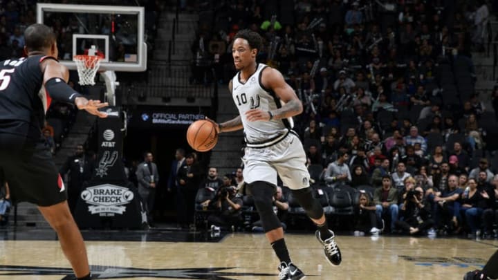 SAN ANTONIO, TX - NOVEMBER 16: DeMar DeRozan #10 of the San Antonio Spurs handles the ball against the Portland Trail Blazers on November 16, 2019 at the AT&T Center in San Antonio, Texas. NOTE TO USER: User expressly acknowledges and agrees that, by downloading and or using this photograph, user is consenting to the terms and conditions of the Getty Images License Agreement. Mandatory Copyright Notice: Copyright 2019 NBAE (Photos by Logan Riely/NBAE via Getty Images)