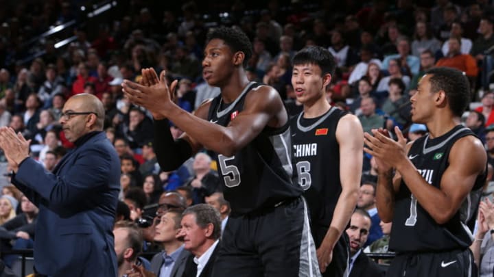 PORTLAND, OR - APRIL 13: R.J. Barrett #5 of Team World claps from the bench during the game against Team USA during the Nike Hoop Summit on April 13, 2018 at the MODA Center Arena in Portland, Oregon. NOTE TO USER: User expressly acknowledges and agrees that, by downloading and or using this photograph, User is consenting to the terms and conditions of License Agreement. Mandatory Copyright Notice: Copyright 2018 NBAE (Photo by Sam Forencich/NBAE via Getty Images)