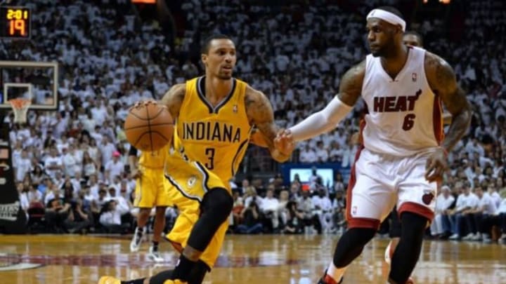May 24, 2014; Miami, FL, USA; Indiana Pacers guard George Hill (3) drives to the basket guarded by Miami Heat forward LeBron James (6) in game three of the Eastern Conference Finals of the 2014 NBA Playoffs at American Airlines Arena. Miami Heat defeated the Indiana Pacers 99-87. Mandatory Credit: Steve Mitchell-USA TODAY Sports