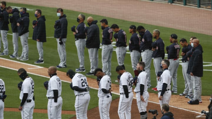 Apr 1, 2021; Detroit, Michigan, USA; Players and managers from both teams stand and listen to the national anthem before the game between the Detroit Tigers and the Cleveland Indians on Opening Day at Comerica Park. Mandatory Credit: Raj Mehta-USA TODAY Sports