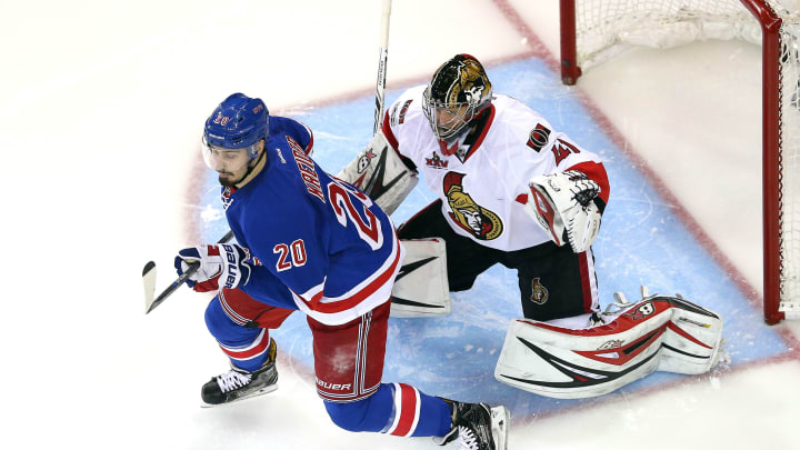 May 4, 2017; New York, NY, USA; New York Rangers left wing Chris Kreider (20) plays the puck in front of Ottawa Senators goalie Craig Anderson (41) during the second period of game four of the second round of the 2017 Stanley Cup Playoffs at Madison Square Garden. Mandatory Credit: Brad Penner-USA TODAY Sports