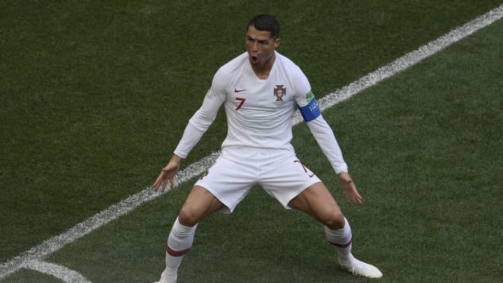 TOPSHOT - Portugal's forward Cristiano Ronaldo celebrates his opening goal for Portugal during the Russia 2018 World Cup Group B football match between Portugal and Morocco at the Luzhniki Stadium in Moscow on June 20, 2018. (Photo by Juan Mabromata / AFP) / RESTRICTED TO EDITORIAL USE - NO MOBILE PUSH ALERTS/DOWNLOADS (Photo credit should read JUAN MABROMATA/AFP/Getty Images)