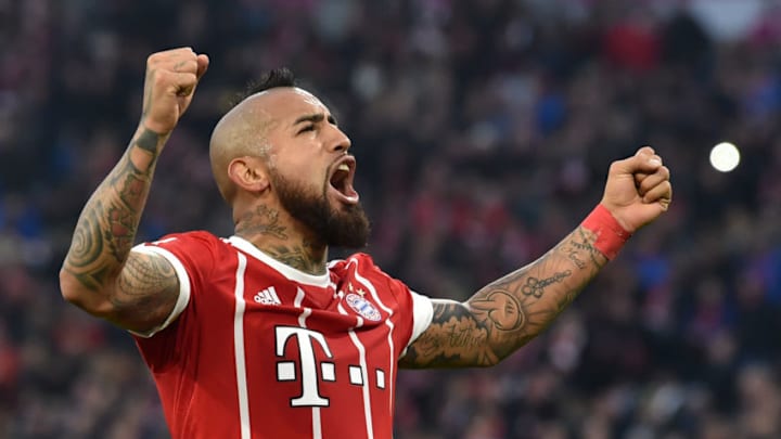 Bayern Munich's Chilean midfielder Arturo Vidal celebrates scoring the opening goal during the German first division Bundesliga football match Bayern Munich vs FC Augsburg in Munich, southern Germany, on November 18, 2017. / AFP PHOTO / Christof STACHE / RESTRICTIONS: DURING MATCH TIME: DFL RULES TO LIMIT THE ONLINE USAGE TO 15 PICTURES PER MATCH AND FORBID IMAGE SEQUENCES TO SIMULATE VIDEO. == RESTRICTED TO EDITORIAL USE == FOR FURTHER QUERIES PLEASE CONTACT DFL DIRECTLY AT 49 69 650050 (Photo credit should read CHRISTOF STACHE/AFP/Getty Images)